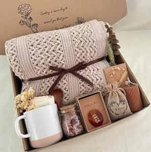 Self care gift box with pampering items, candle and relaxation treats for stress relief